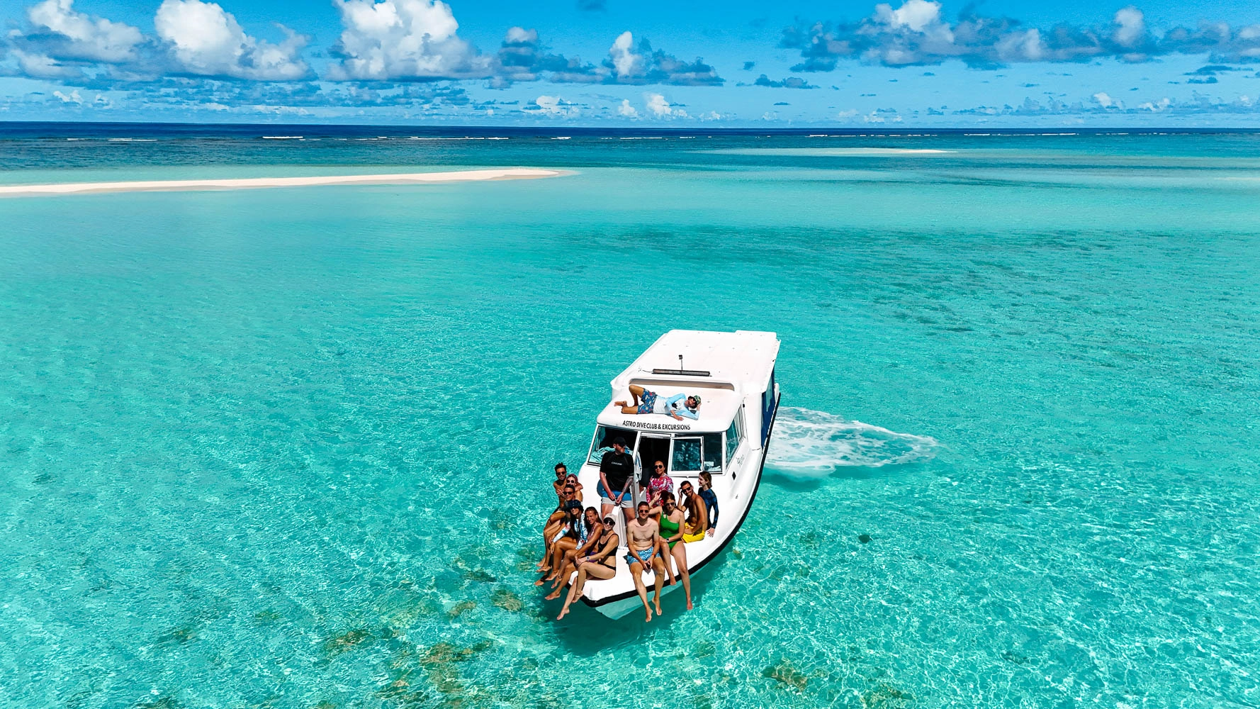 Speedboat excursion with tourists enjoying Thoddoo Island marine adventure in crystal clear Maldives waters